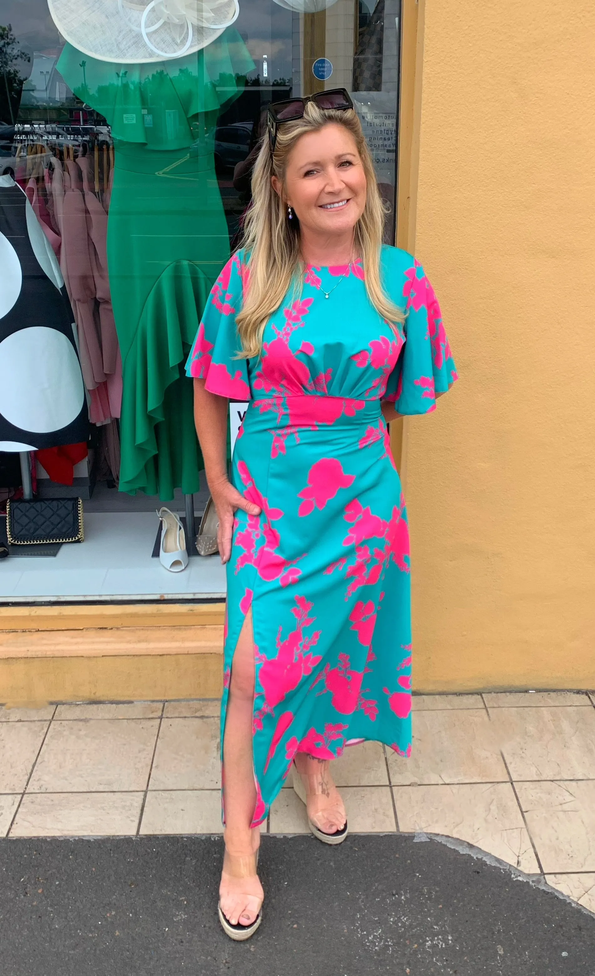 Day date Angel wing sleeve turquoise and fuchsia print  split dress