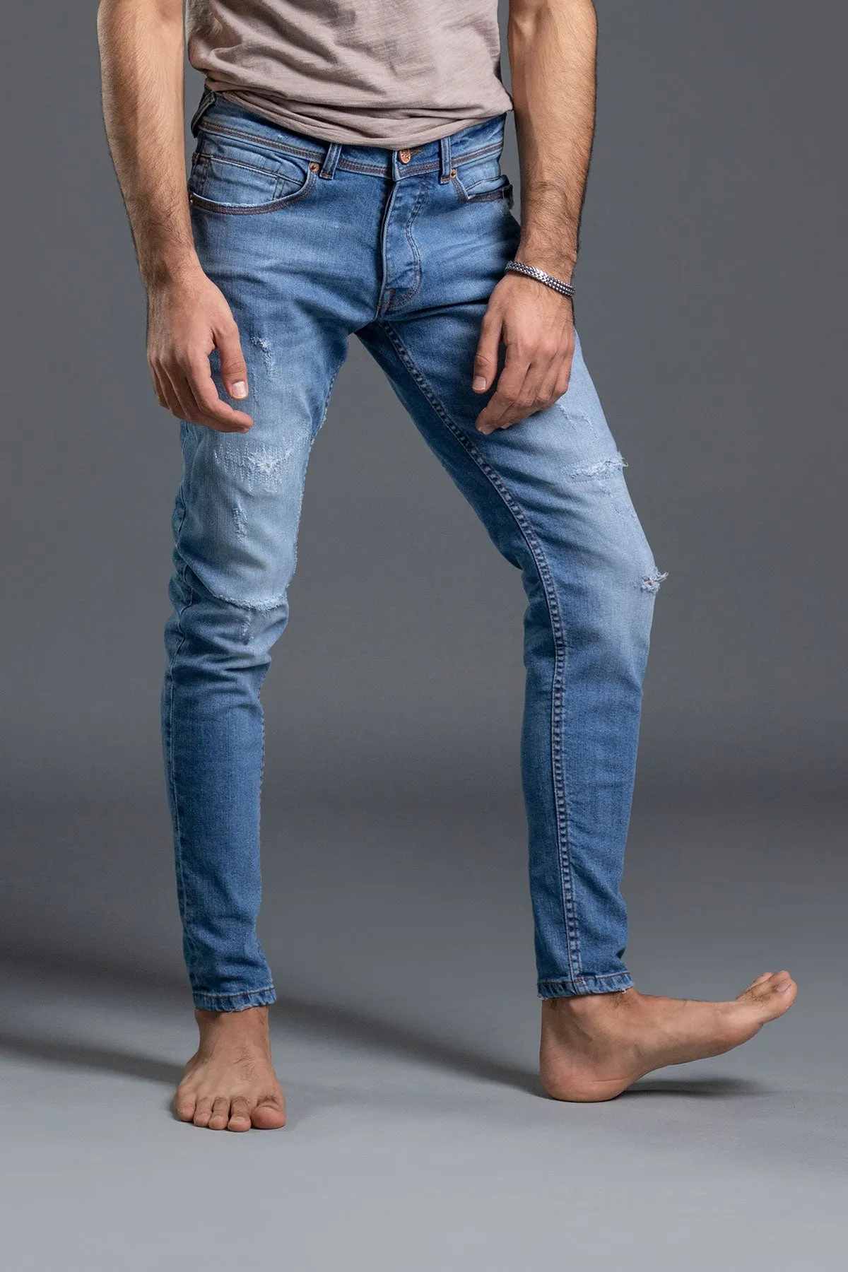 Stretchable Skinny With Grinding Jeans (Light Blue) ( Aphatus )